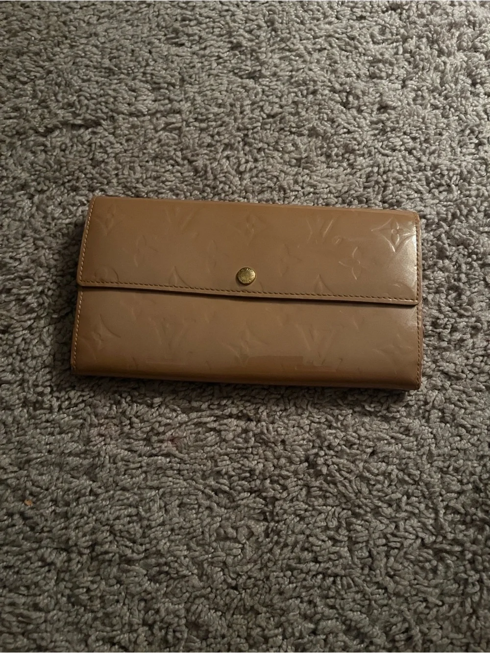 Louis Vuitton sleek leather tan wallet